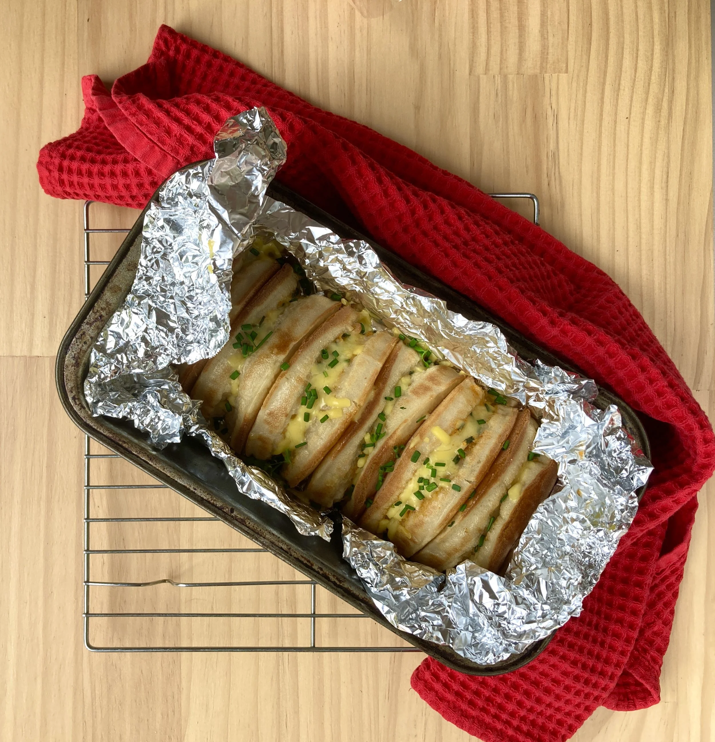 Cheesy Garlic Crumpets